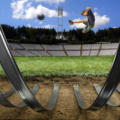 Heating ribbon below sports turf